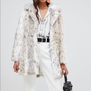 Gorgeous faux fur coat.